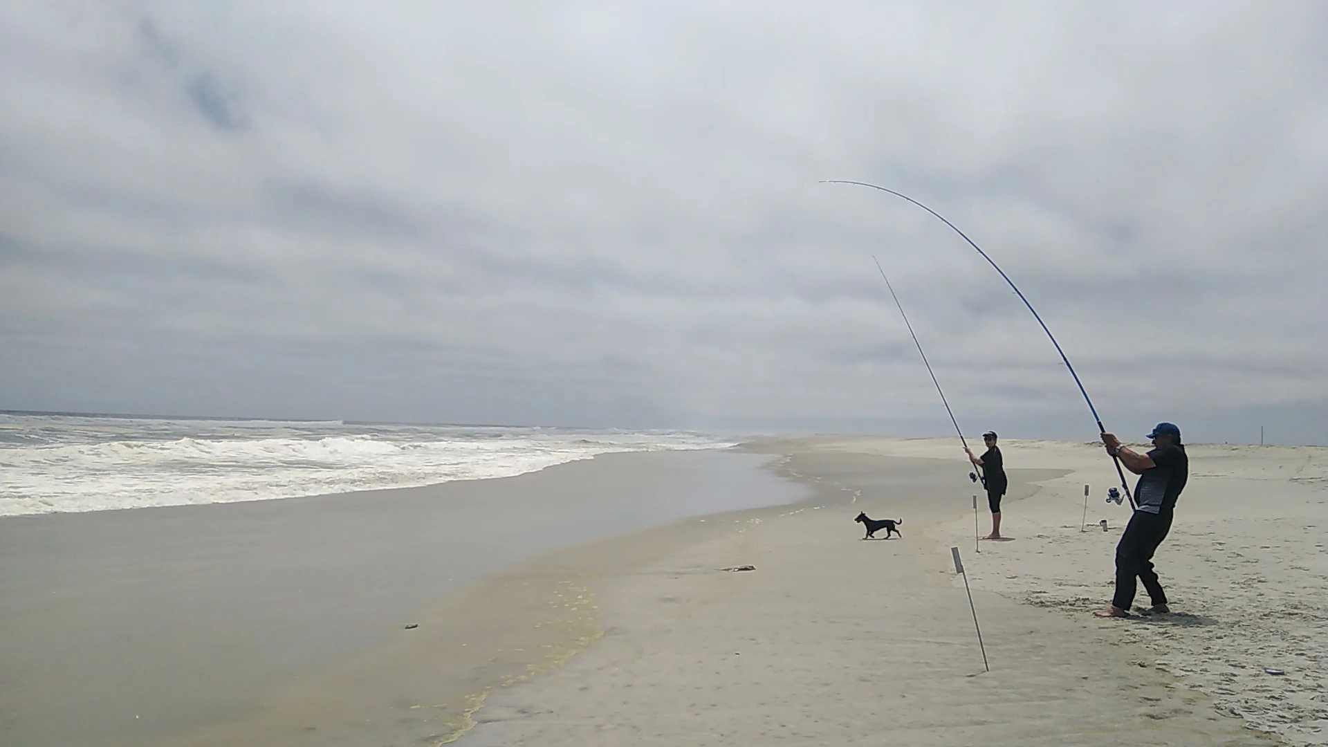 Anglers fishing from the surf near Henties Bay